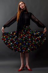 Vintage Saint Laurent 1982 Zodiac Sign Pleated Skirt on model Emily @ Recess LA