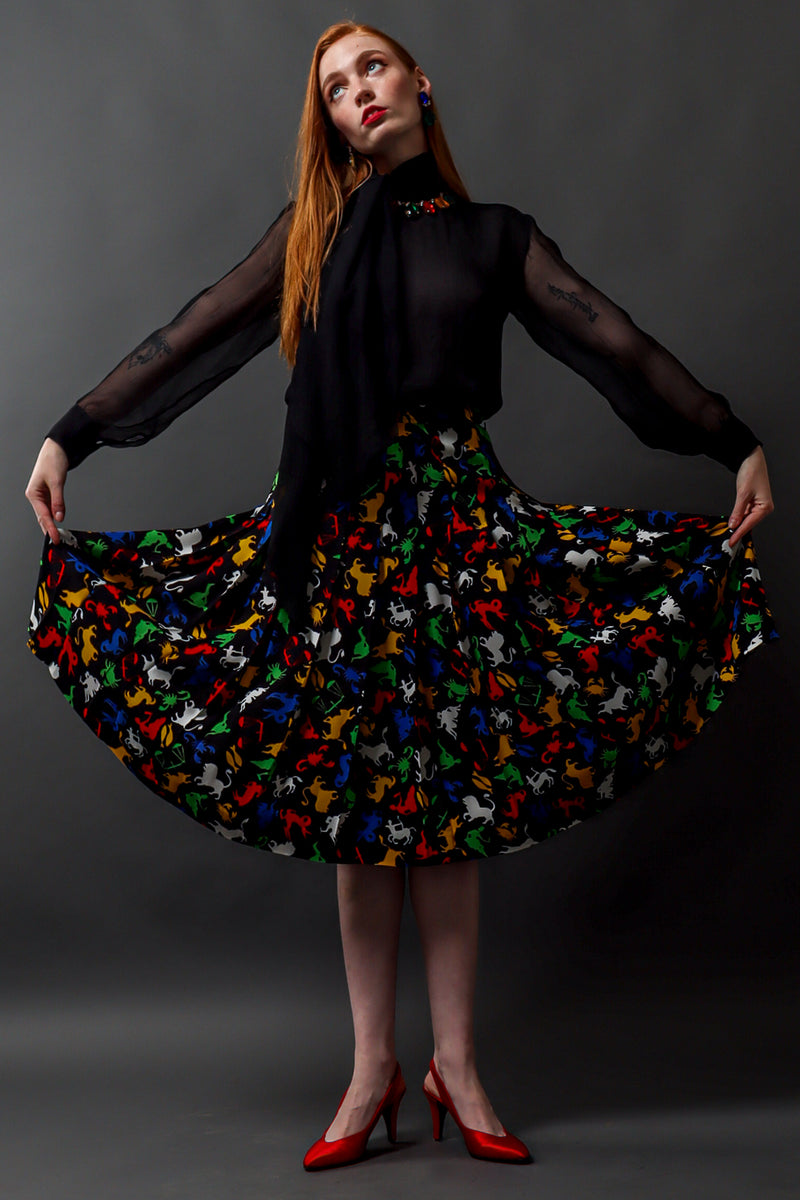 Vintage Saint Laurent 1982 Zodiac Sign Pleated Skirt on model Emily @ Recess LA