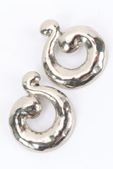 Vintage Yves Saint Laurent Swirl Hoop Earrings diagonal creative flat @ Recess LA