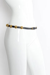 Vintage YSL Saint Laurent Circular Dome Leather Belt mannequin angle @ Recess Los Angeles