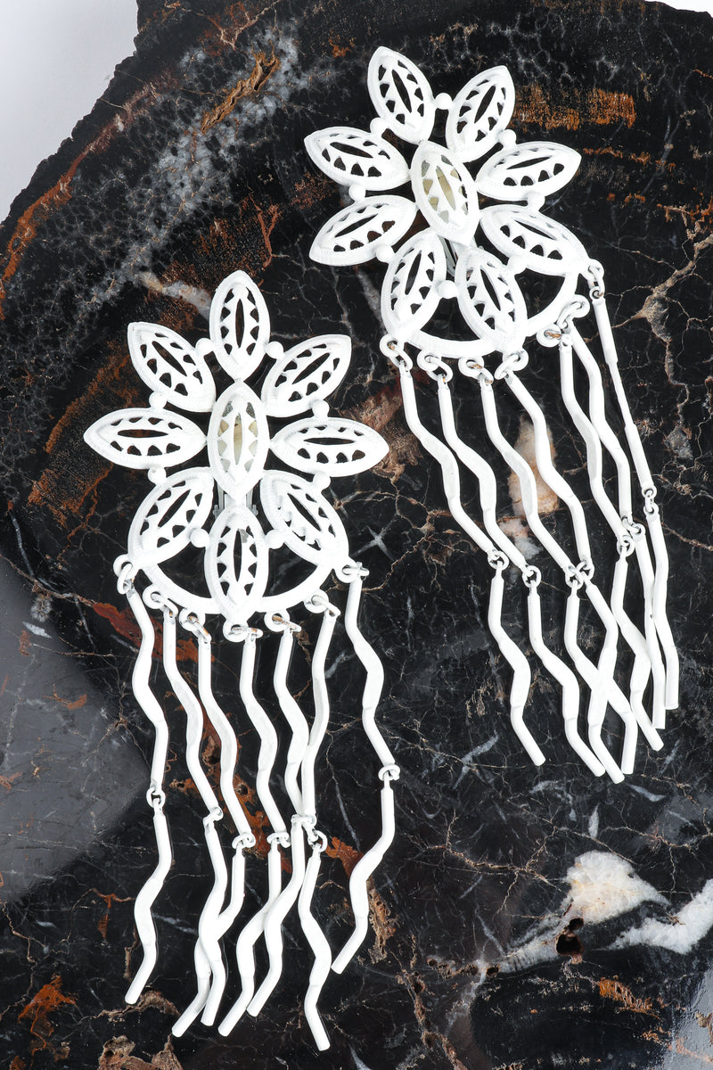 Vintage Yohai White Flower Fringe Earring on petrified wood at Recess Los Angeles